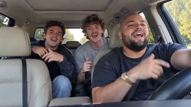 AI rap video example of three friends rapping together inside a car